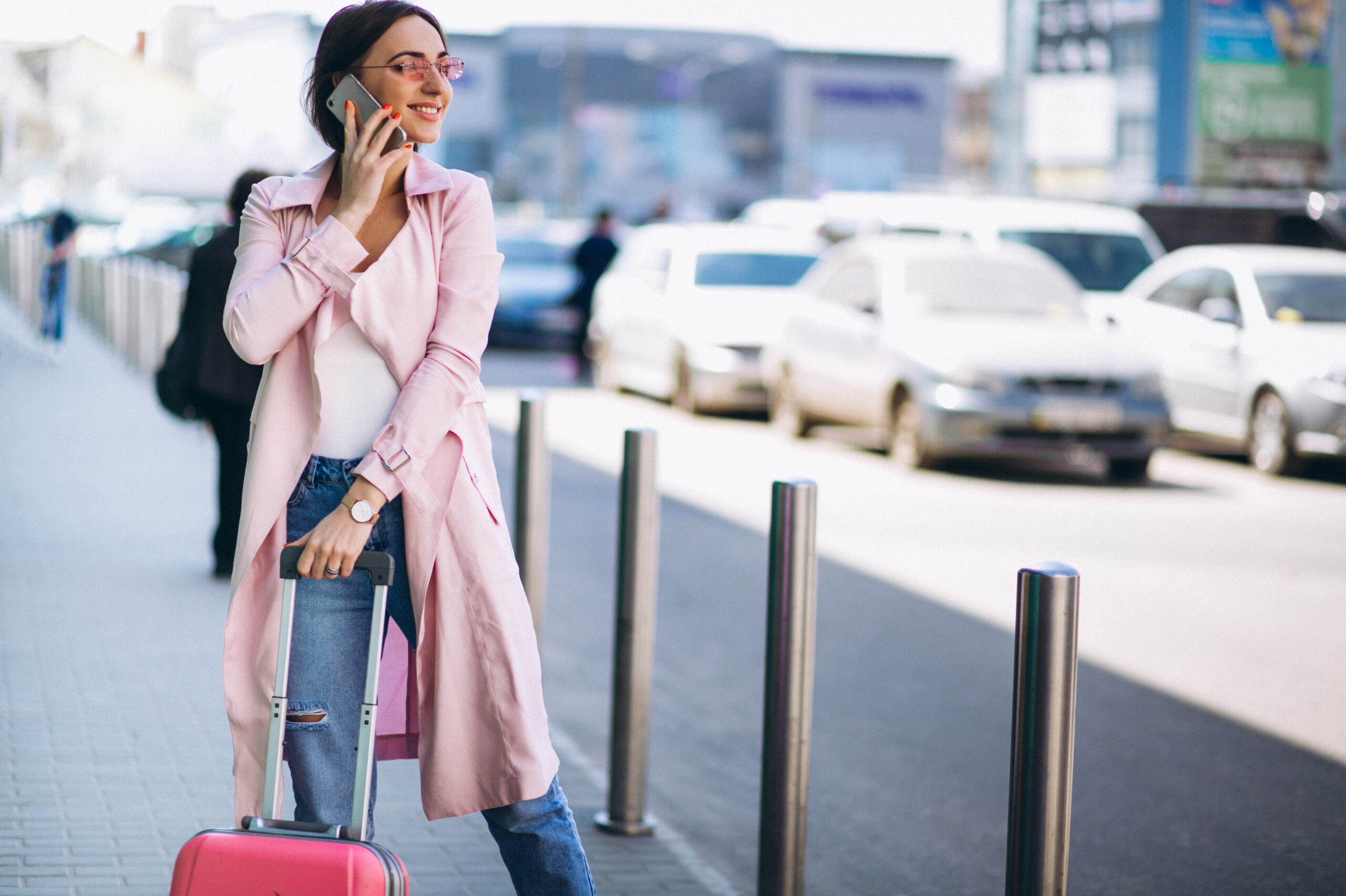 Woman with phone at airport